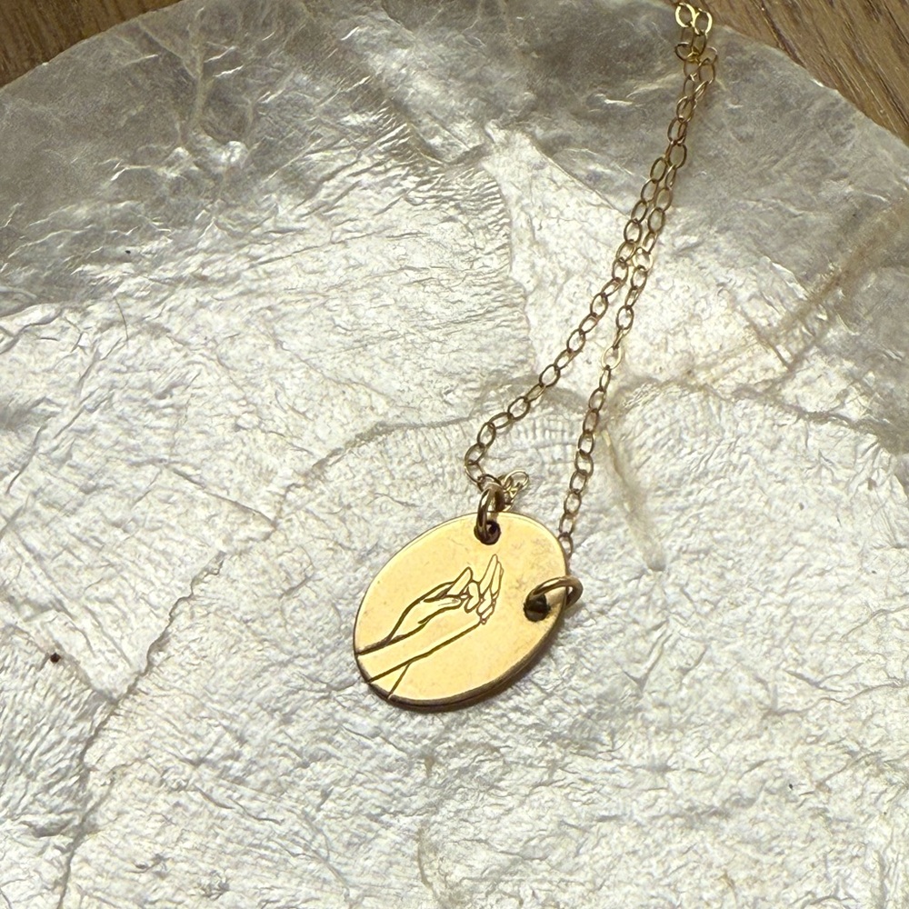 Gold Intertwined Hands Pendant Necklace